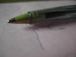 A picture of a pen and some writing